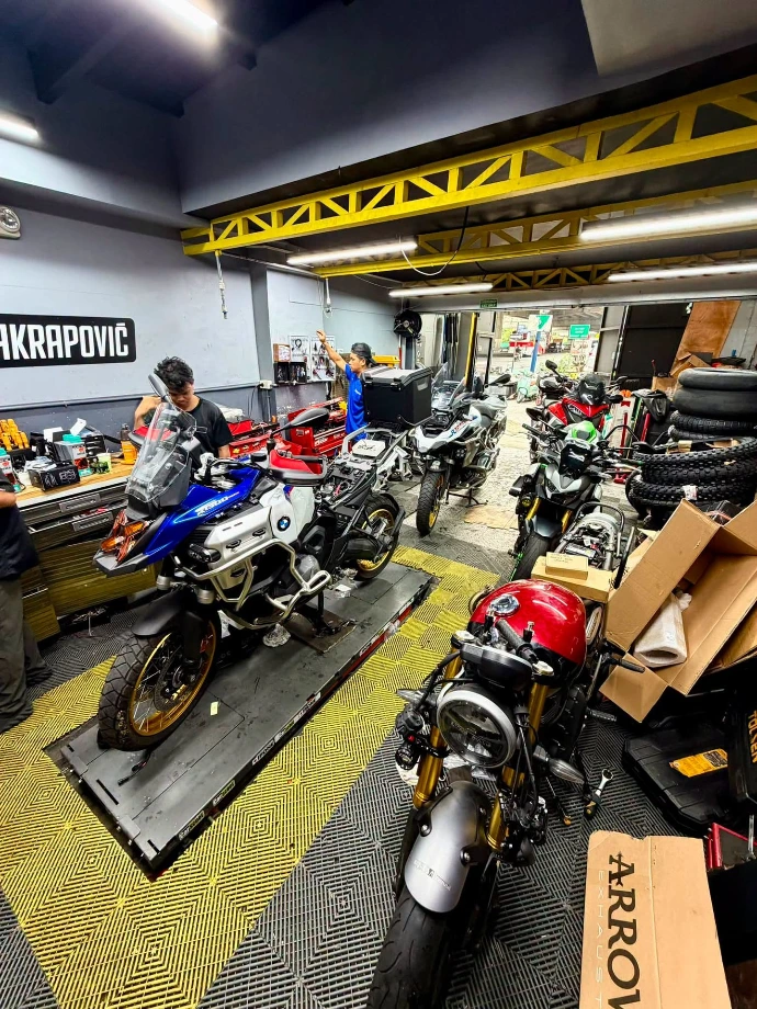 Motorcycle maintenance, diagnostics, and repair workshop at CarScoot